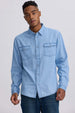 Camisa hombre clásica azul con bolsillos frontales y botones, estilo casual.