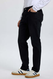 Jeans Hombre 703 Slim Negro de denim elástico