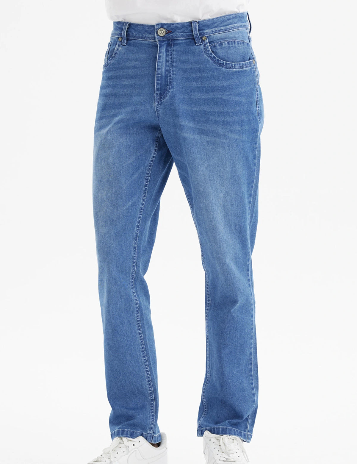 Jeans slim azul para hombre con diseño liso corte ajustado y efecto deslavado ligero en las piernas