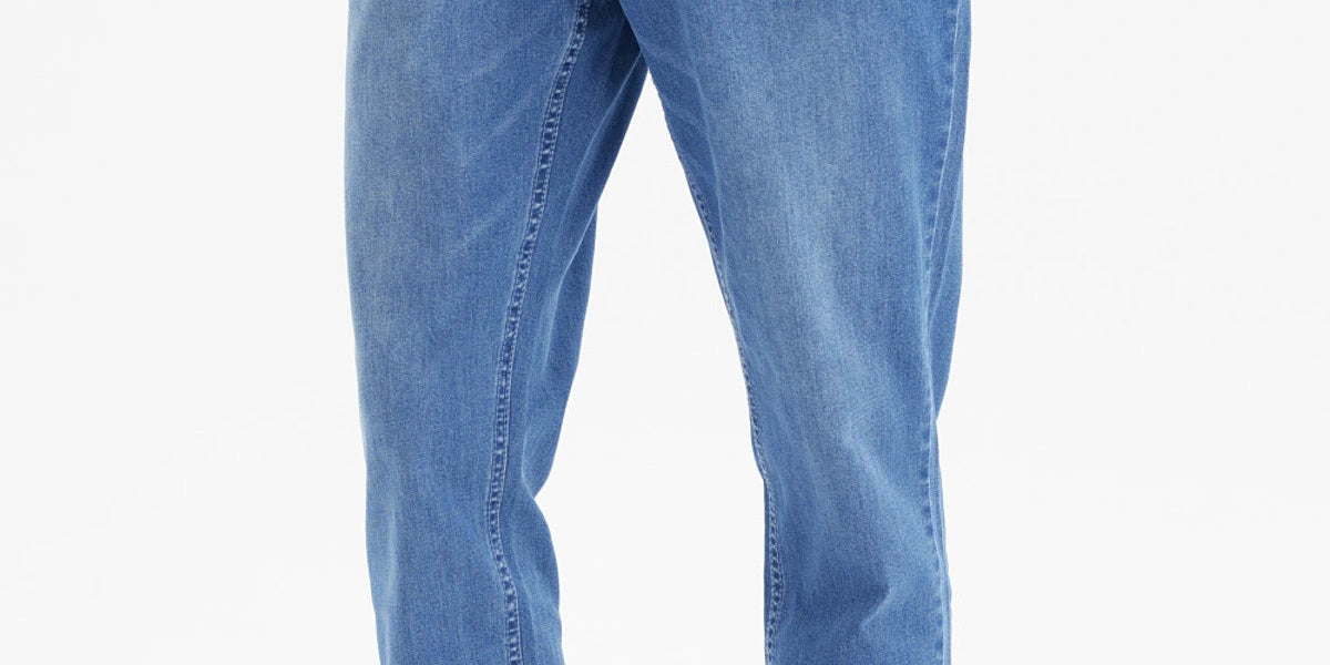 Jeans slim azul para hombre con diseño liso corte ajustado y efecto deslavado ligero en las piernas