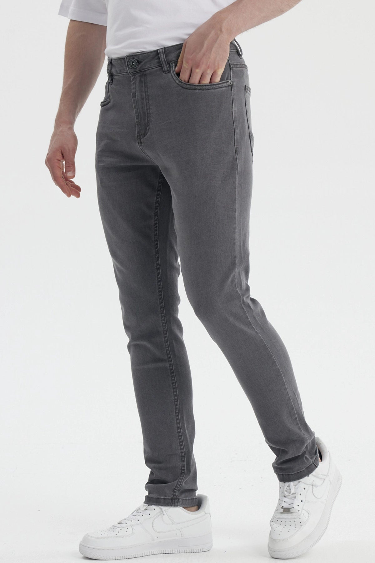 Jeans skinny gris oscuro para hombre diseño liso ajuste moderno sin estampas visibles