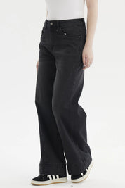 Jeans mujer wide leg negro diseño liso estilo clásico con corte recto amplio hasta el suelo sin estampa visible