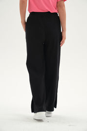 Pantalón Buzo Mujer Apertura Bota Negro