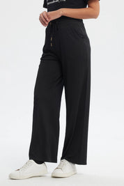 Pantalón Buzo Mujer Detalles Ojetillos Negro