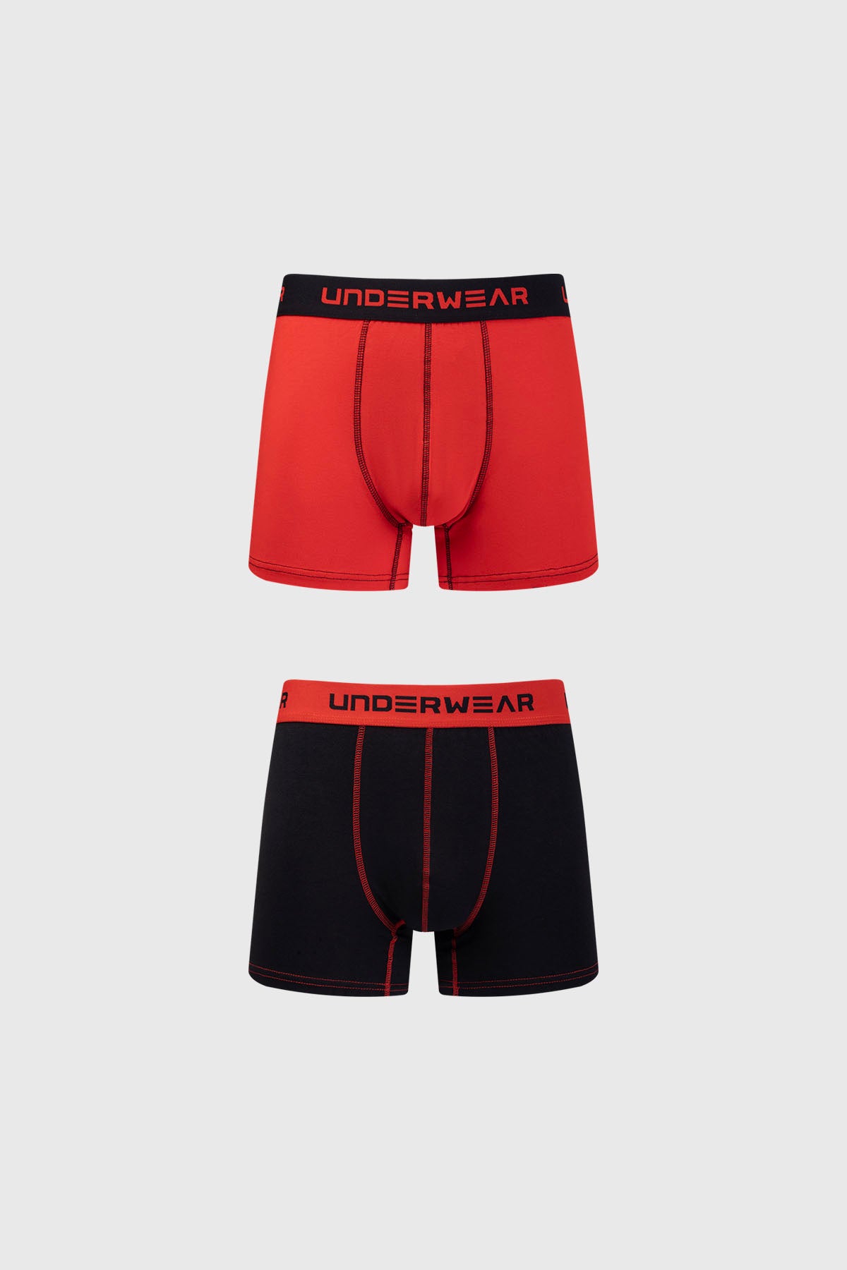 Boxer bipack rojo y negro con cinturilla 'UNDERWEAR' visible en rojo y negro