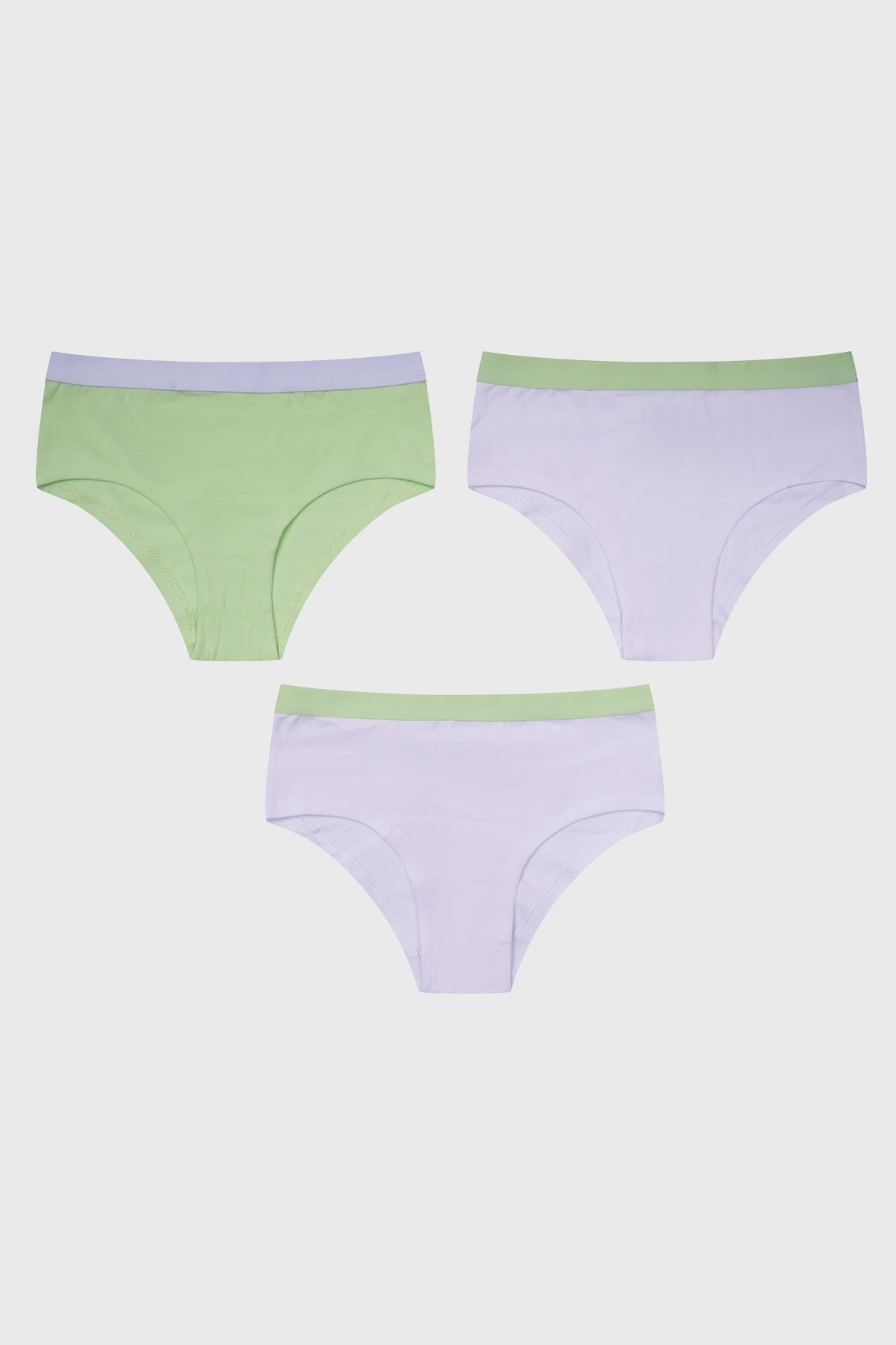 Pantaleta tripack para niña en verde claro y blanco con cinturas en tonos pastel