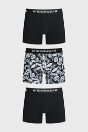 Boxer hombre tripack negro dos lisos y uno con estampado de hojas tropicales en blanco y azul con cinturilla elástica