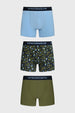 Boxer hombre tripack verde incluye uno liso azul claro uno estampado geométrico y uno liso verde todos con cinturilla negra