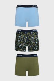 Boxer hombre tripack verde incluye uno liso azul claro uno estampado geométrico y uno liso verde todos con cinturilla negra