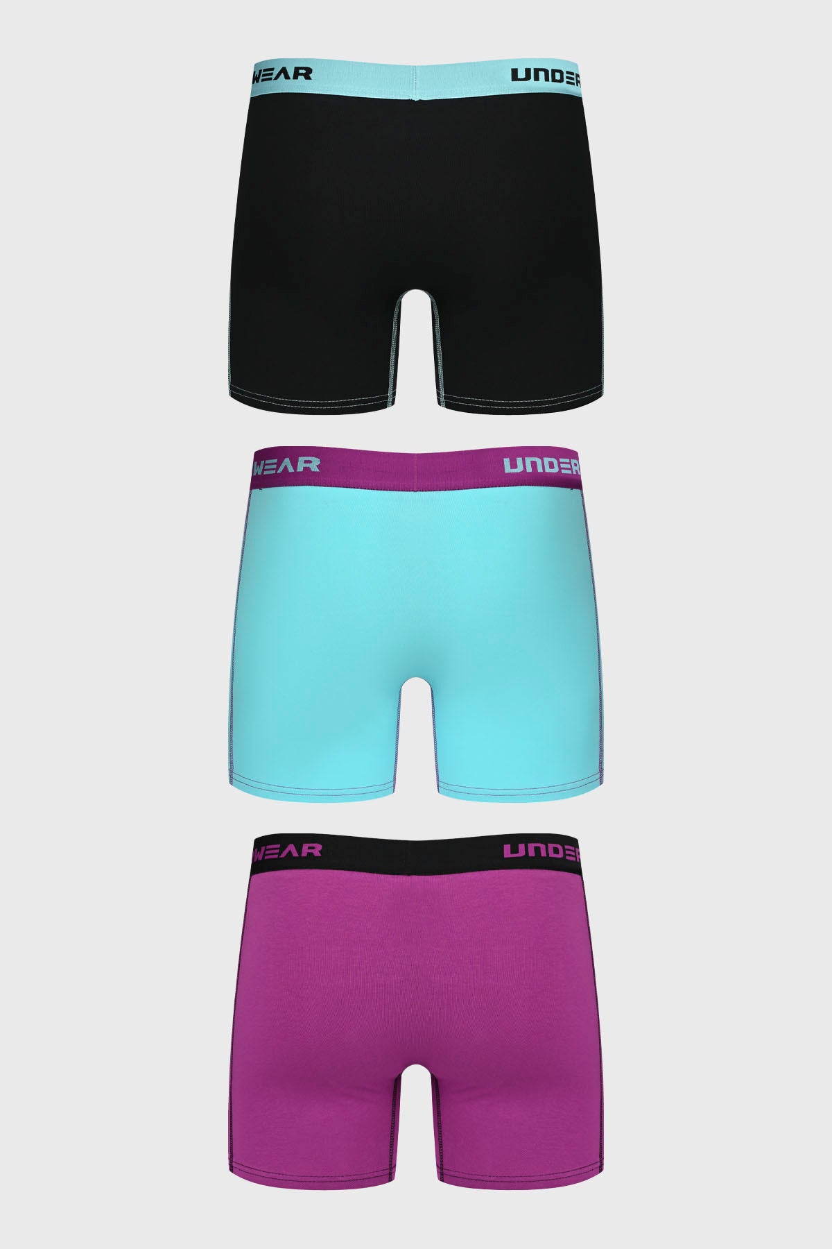 Boxer hombre tripack medio violeta incluye tres diseños lisos en colores negro celeste y violeta con cintura elástica estampada