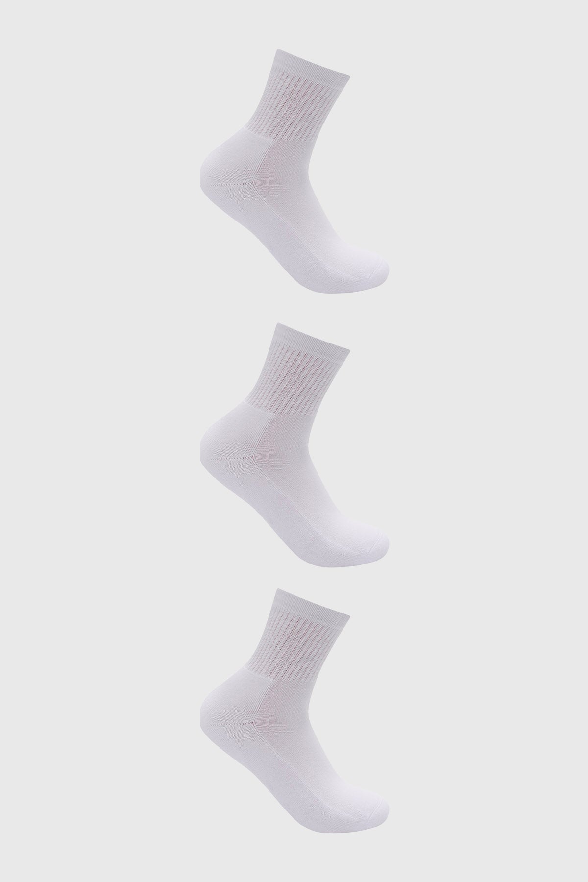 Calcetines unisex blancos lisos con puño elástico en un tripack de estilo clásico y ajuste cómodo