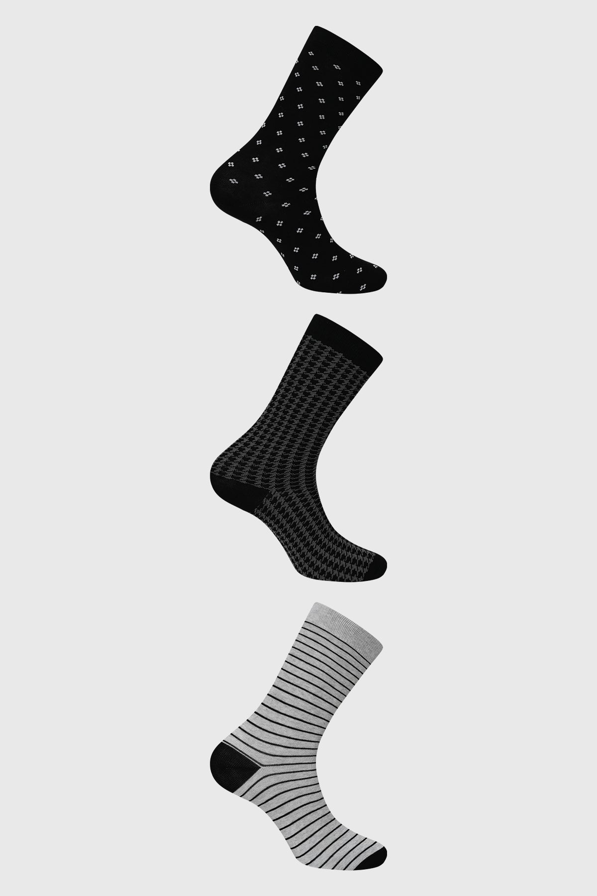 Calcetines hombre tripack azul marino con diseño geométrico y líneas en distintos patrones gráficos