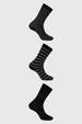 Calcetines negros para hombre con diseños de rayas y puntos en diferentes estilos