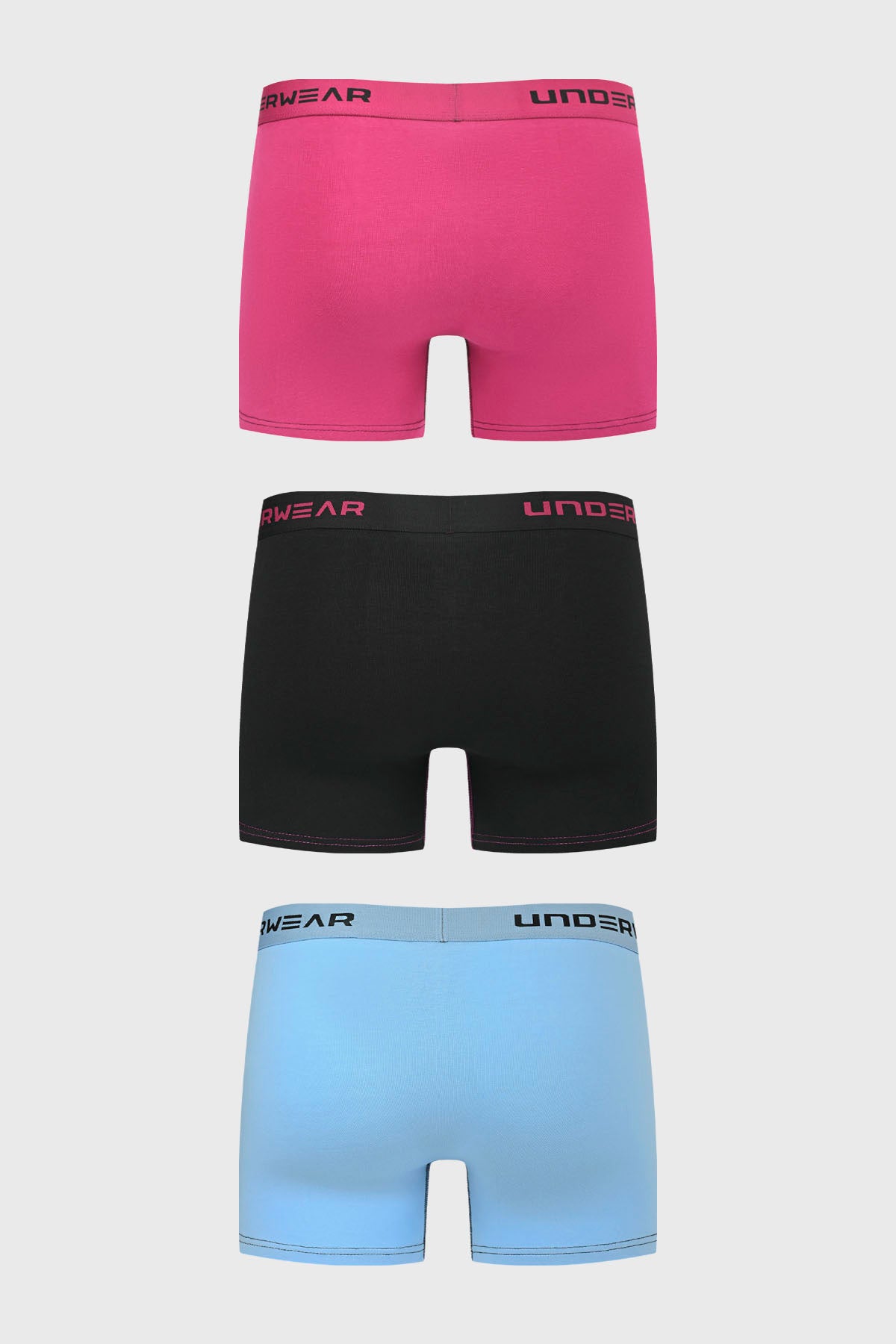 Boxer hombre triapack en violeta negro y azul claro con elástico visible texto UNDERWEAR estampado en la pretina