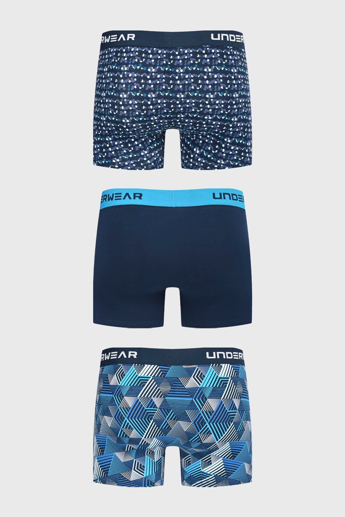 Tripack de boxers para hombre en azul marino con estampado geométrico y cinturilla con texto UNDERWEAR en la parte superior
