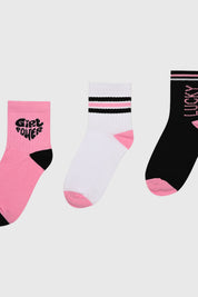 Tripack de calcetines para niña en rosa predominante con diseños Girl Power y Lucky uno liso y otro con rayas