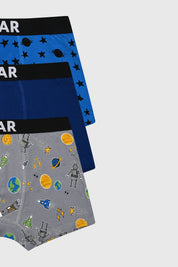 Boxer niño tripack azul con diseños de estrellas en negro y espacio en gris estilo cartoon