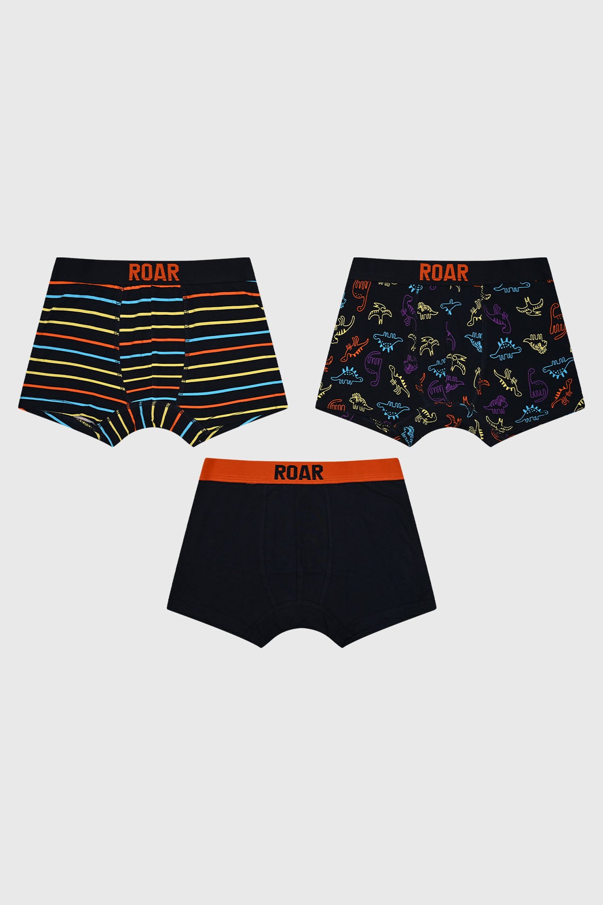 Boxer niño tripack en tonos naranjo uno con rayas otro con dinosaurios y uno liso todos con cintura elástica "ROAR"