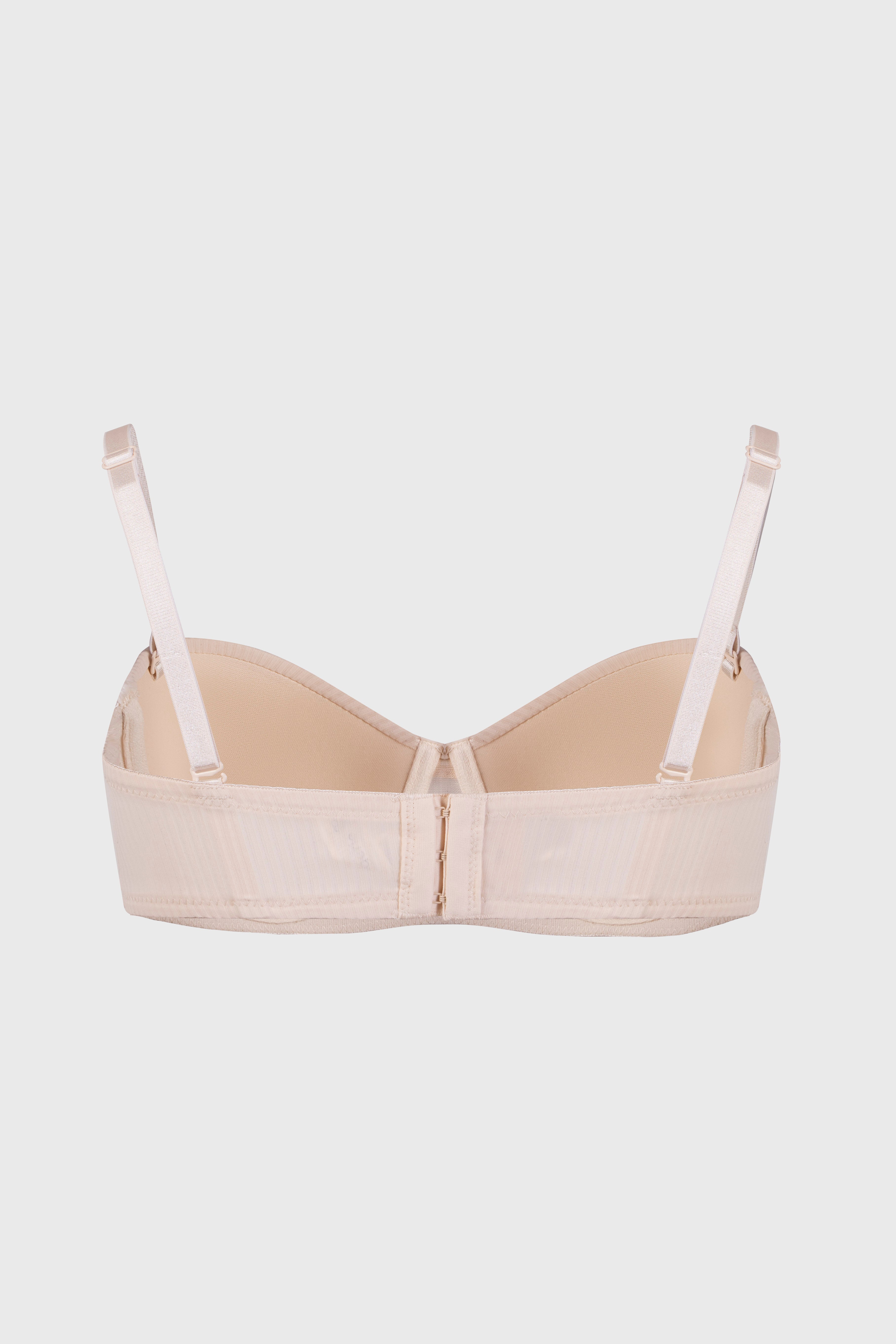 Sostén liso beige para mujer con tirantes ajustables y acabado invisible