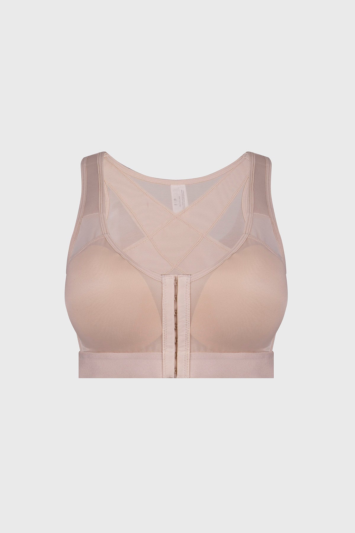 Sostén corrector de postura beige con diseño frontal de malla y cierre central visible