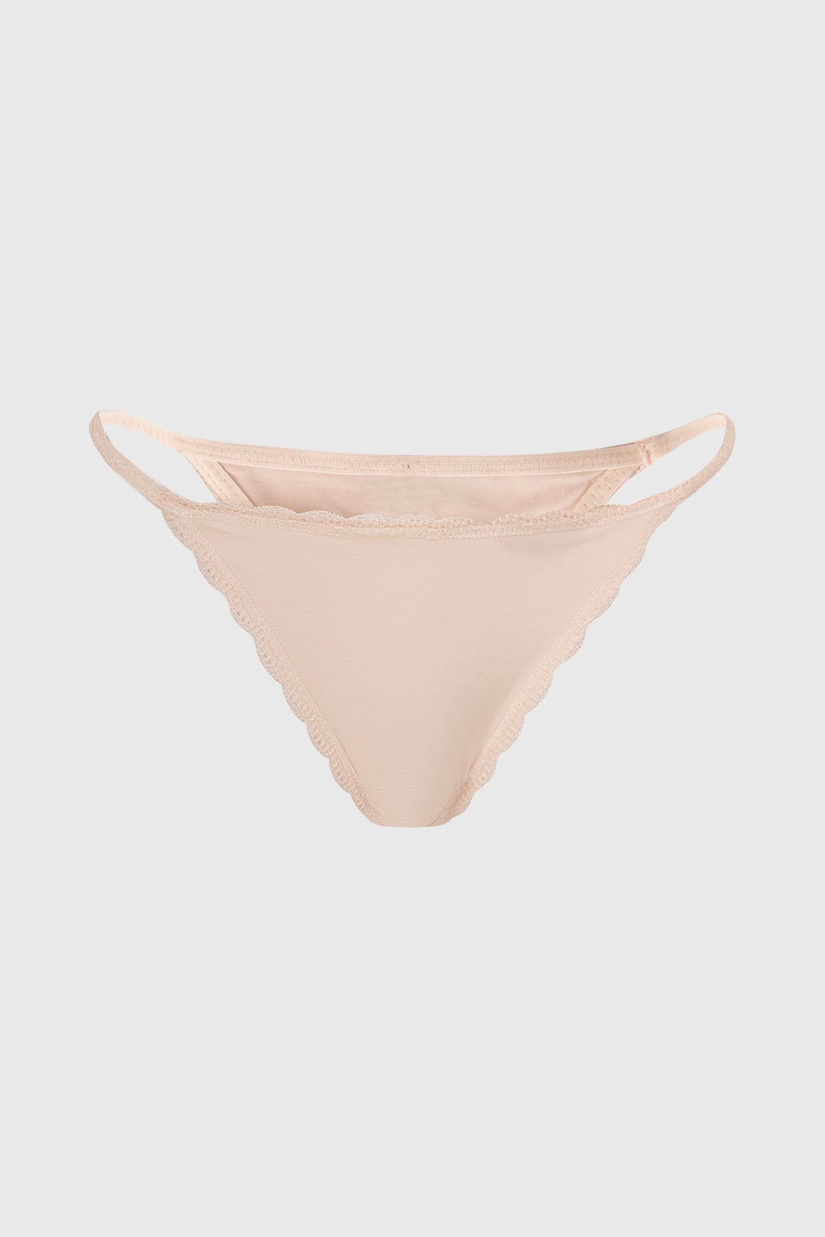 Calzón colaless beige con tirantes y encaje delicado en los bordes