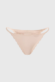 Calzón colaless beige con tirantes y encaje delicado en los bordes