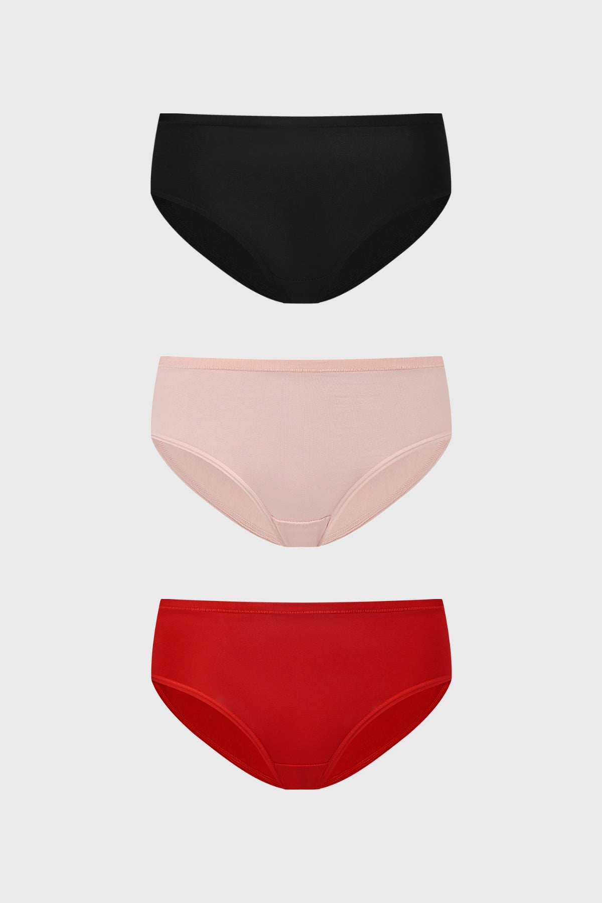Tripack de calzones lisos para mujer en negro palo rosa y rojo diseño clásico y cómodo sin estampa visible