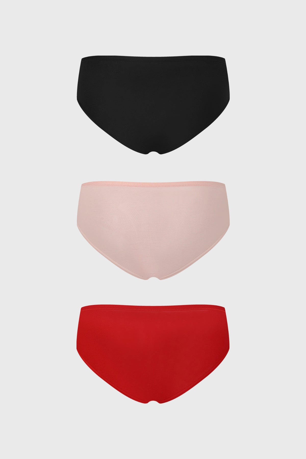 Tripack de calzones lisos para mujer en negro palo rosa y rojo diseño clásico y cómodo sin estampa visible