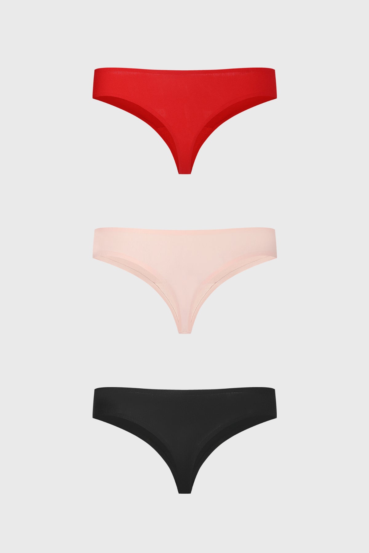 Tripack de calzones colaless en rojo rosa y negro diseño liso de algodón spandex sin estampado visible