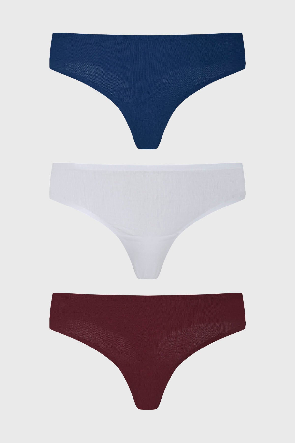 Tripack de calzones colaless azul marino con uno blanco y otro burdeos sin estampa visibles lisos y cómodos
