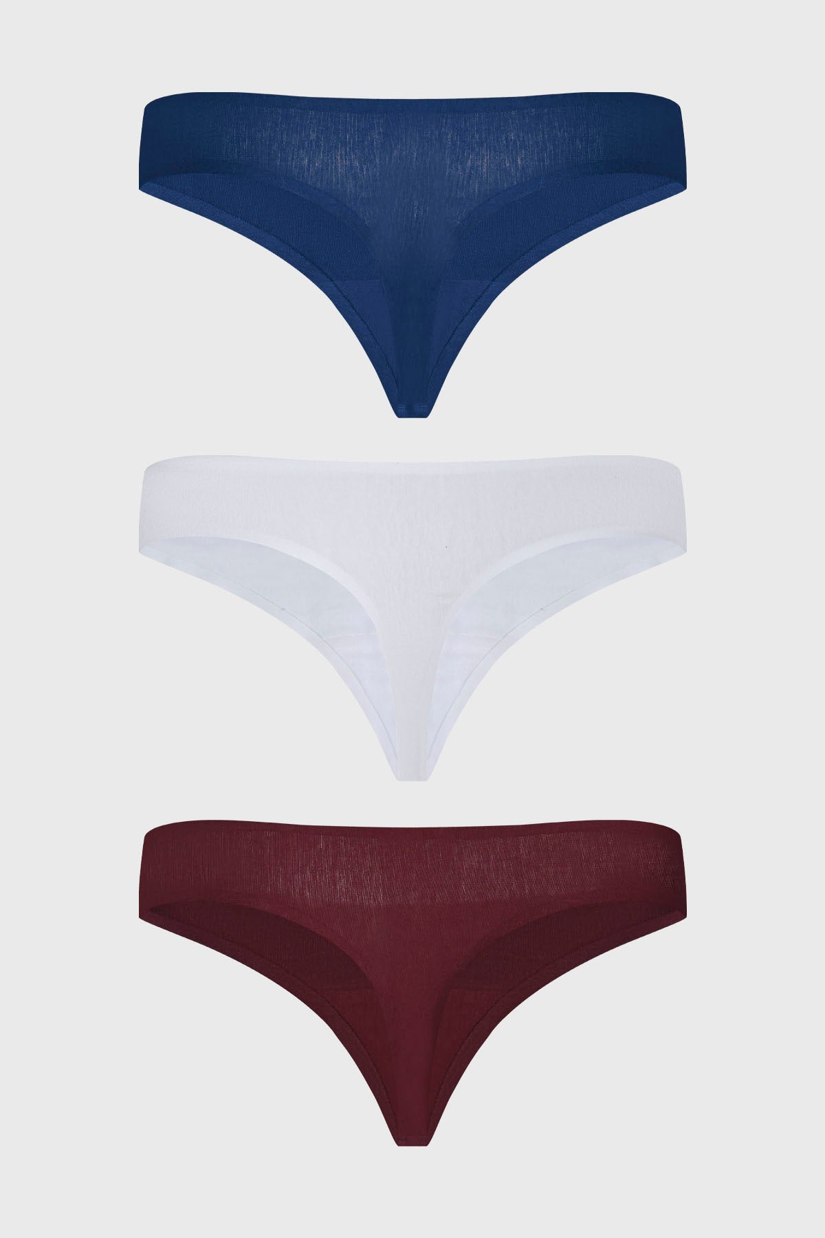 Tripack de calzones colaless azul marino con uno blanco y otro burdeos sin estampa visibles lisos y cómodos