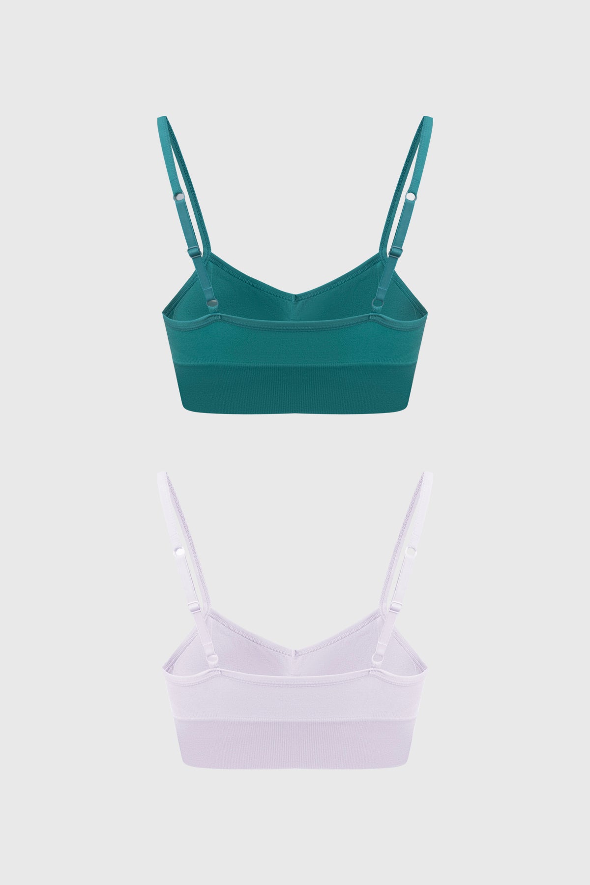 Bipack de sostenes tipo peto liso en aqua y blanco sin estampa con tirantes delgados y banda elástica inferior
