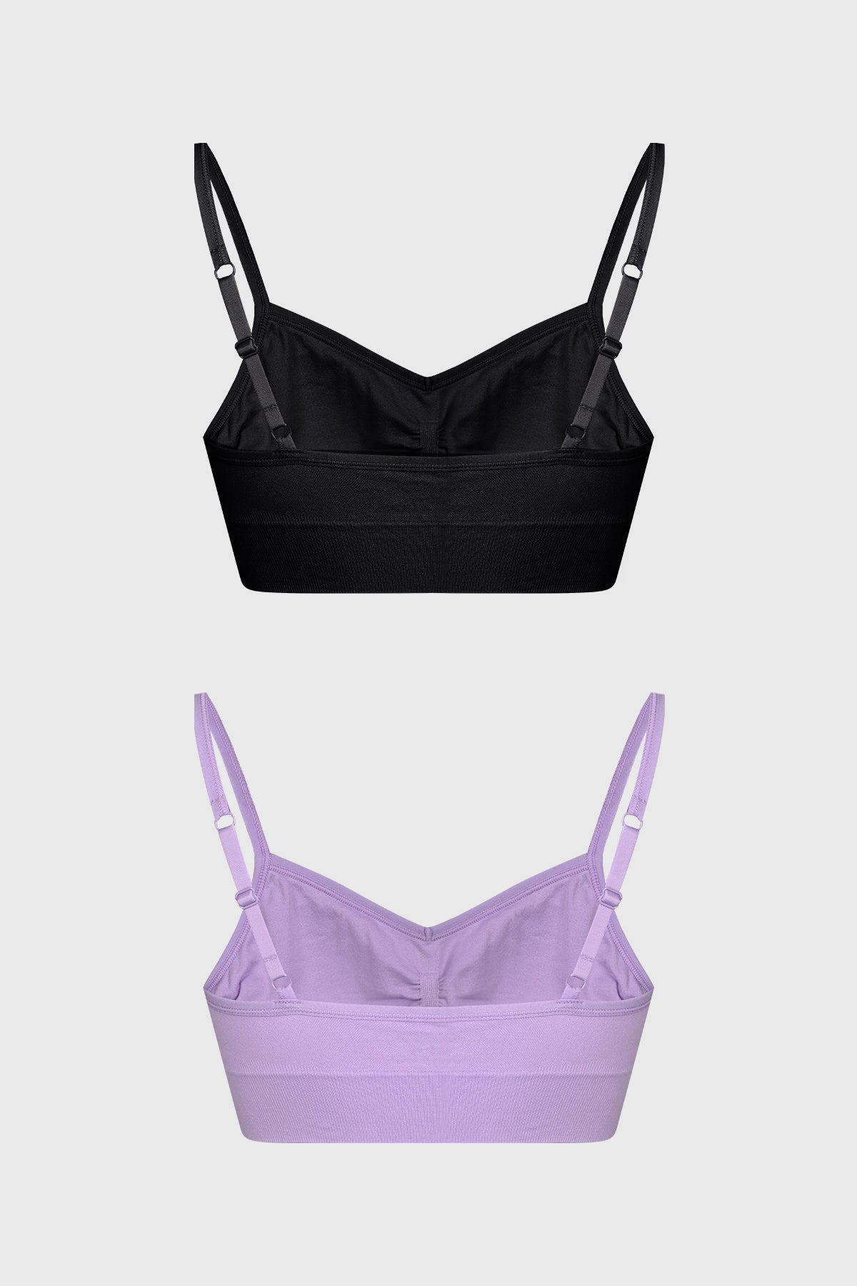 Bipack de petos para mujer en colores negro y lila lisos sin estampas con tirantes delgados y diseño minimalista