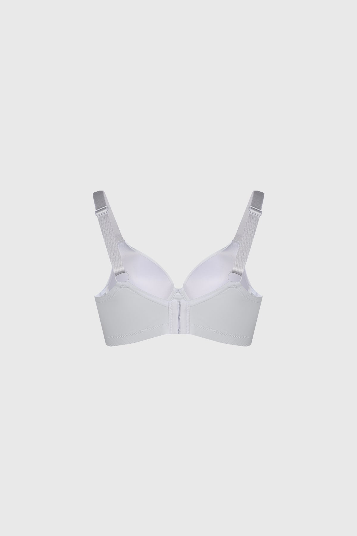Sostén blanco con encaje en laterales y copas lisas ofrece soporte elegante sin estampa visible