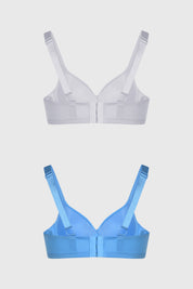 Bipack de sostenes mujer liso azul uno en blanco otro en azul con pequeño lazo central y tirantes ajustables