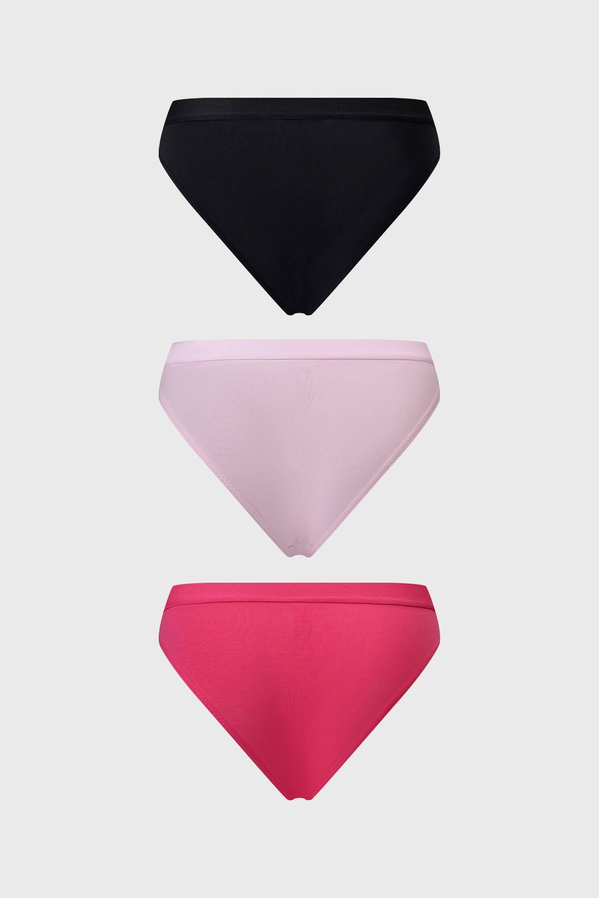 Tripack de calzones bikini en palo rosa negro y fucsia lisos sin estampas con cintura elástica y diseño clásico