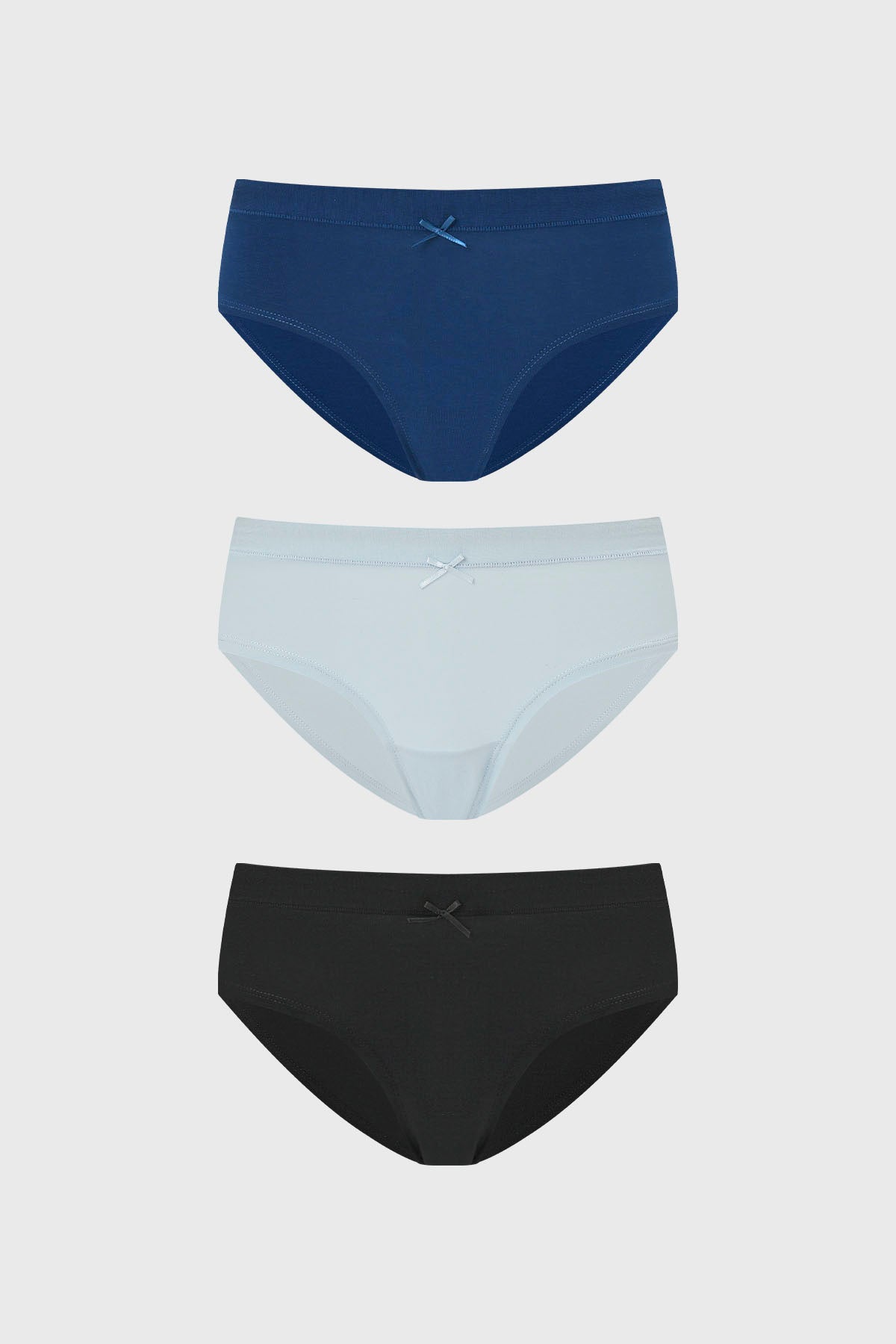 Tripack de calzones mujer pantaleta azul claro en algodón y spandex con moño decorativo central diseño liso