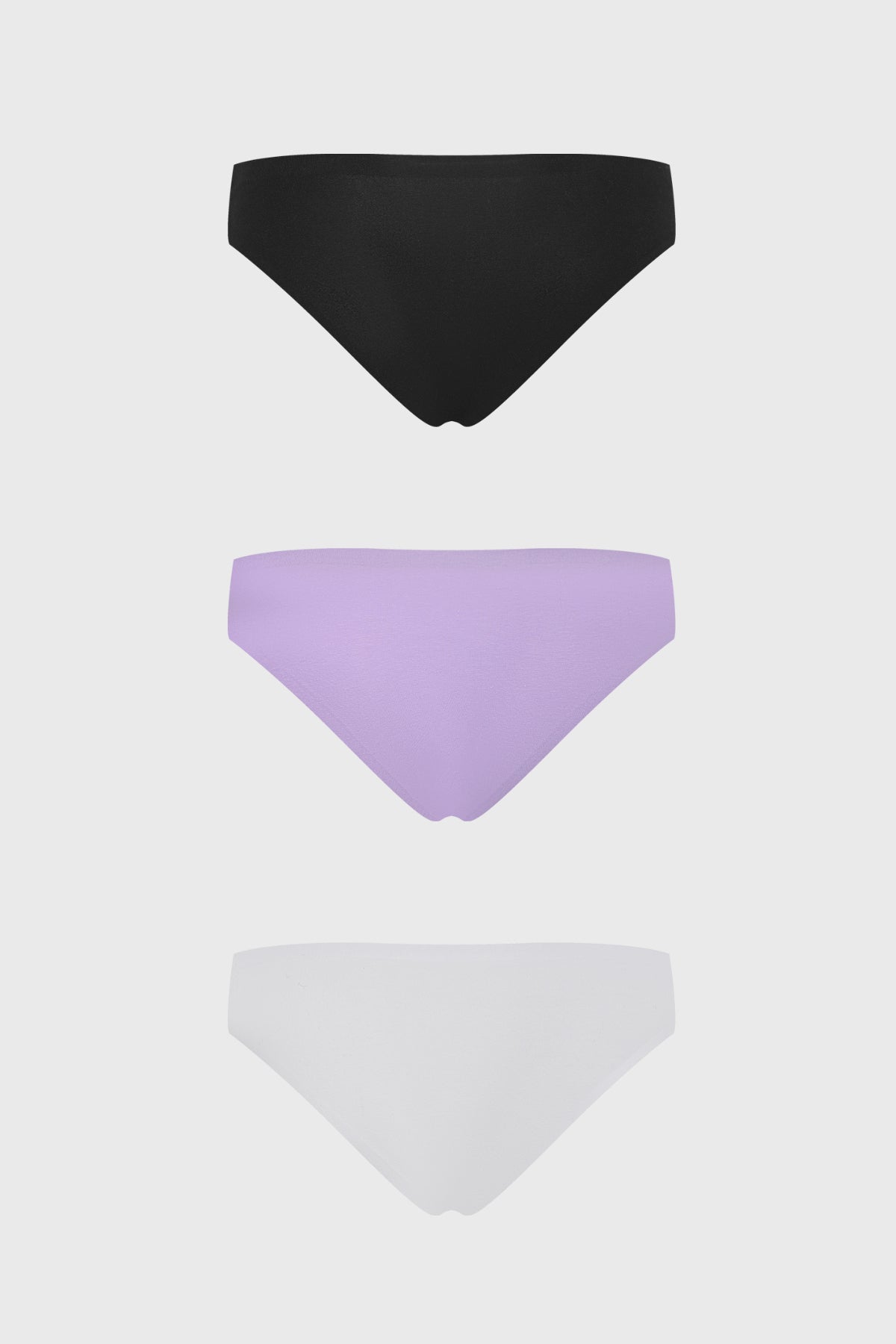 Calzón tripack mujer lila con detalle de encaje en costados colores negro lila y blanco diseño liso elegante