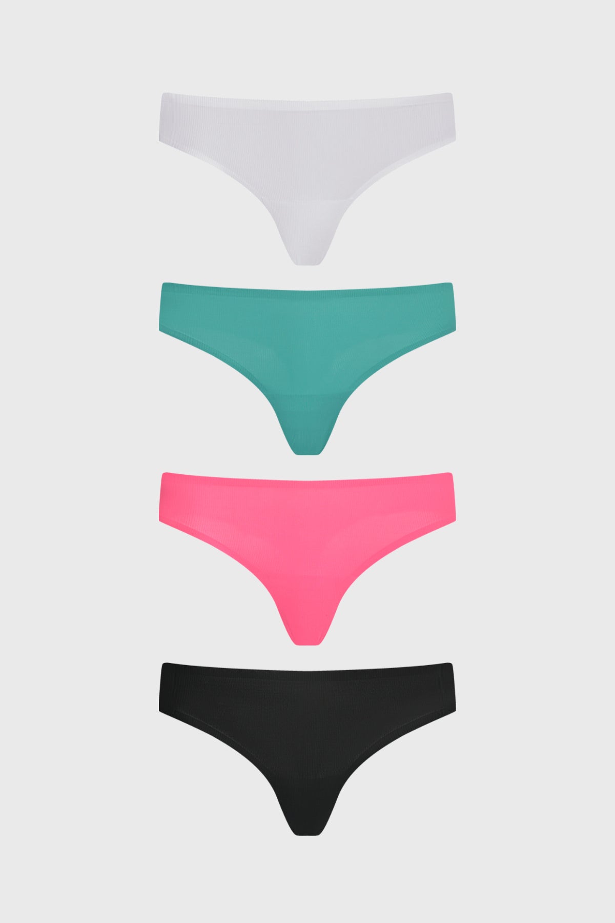 Pack de cuatro calzones colaless en fucsia blanco verde y negro diseño liso sin estampas