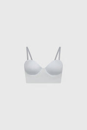 Sostén strapless bustier blanco con diseño liso y tirantes removibles estiliza el busto para ocasiones especiales