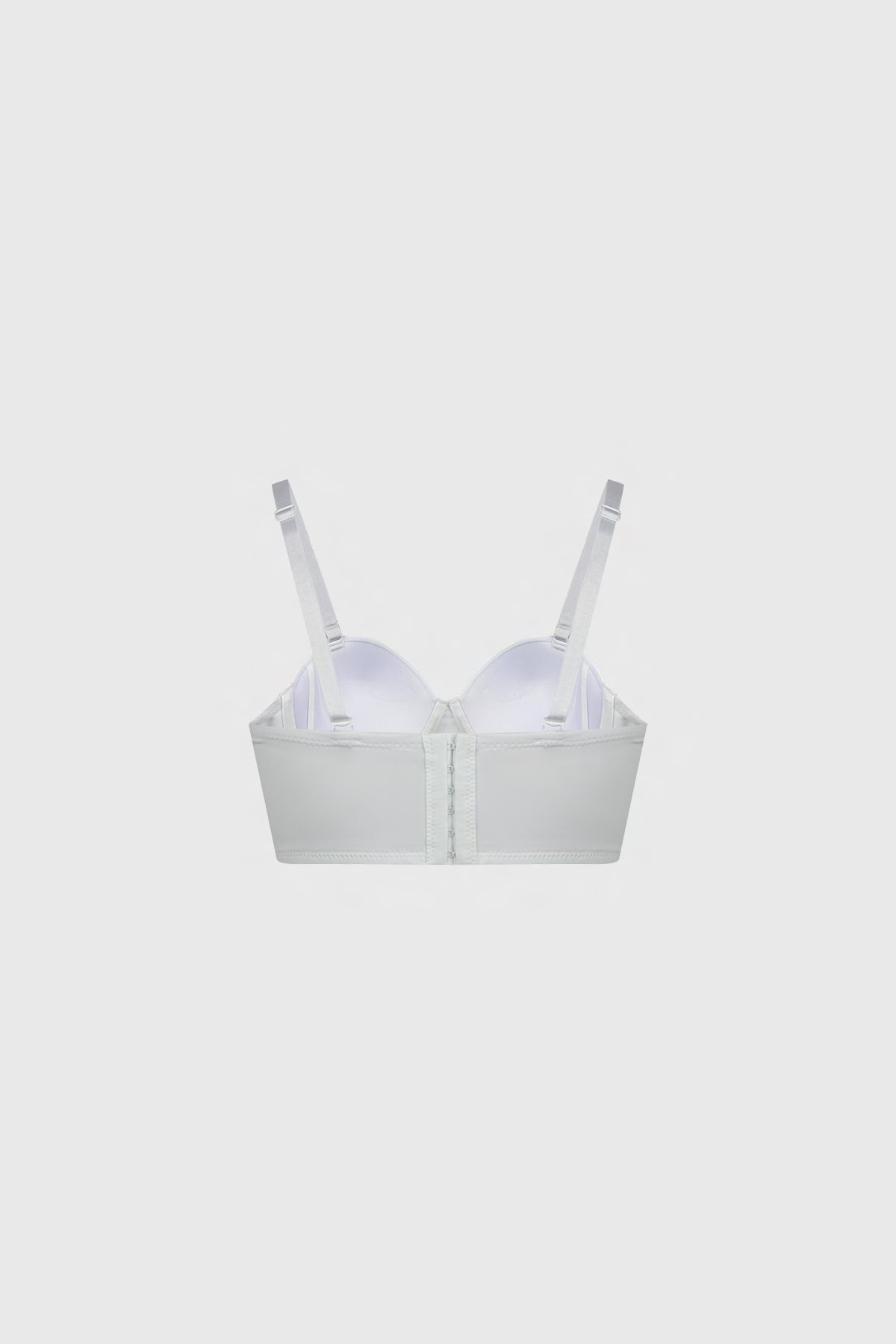 Sostén strapless bustier blanco con diseño liso y tirantes removibles estiliza el busto para ocasiones especiales