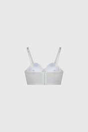 Sostén strapless bustier blanco con diseño liso y tirantes removibles estiliza el busto para ocasiones especiales