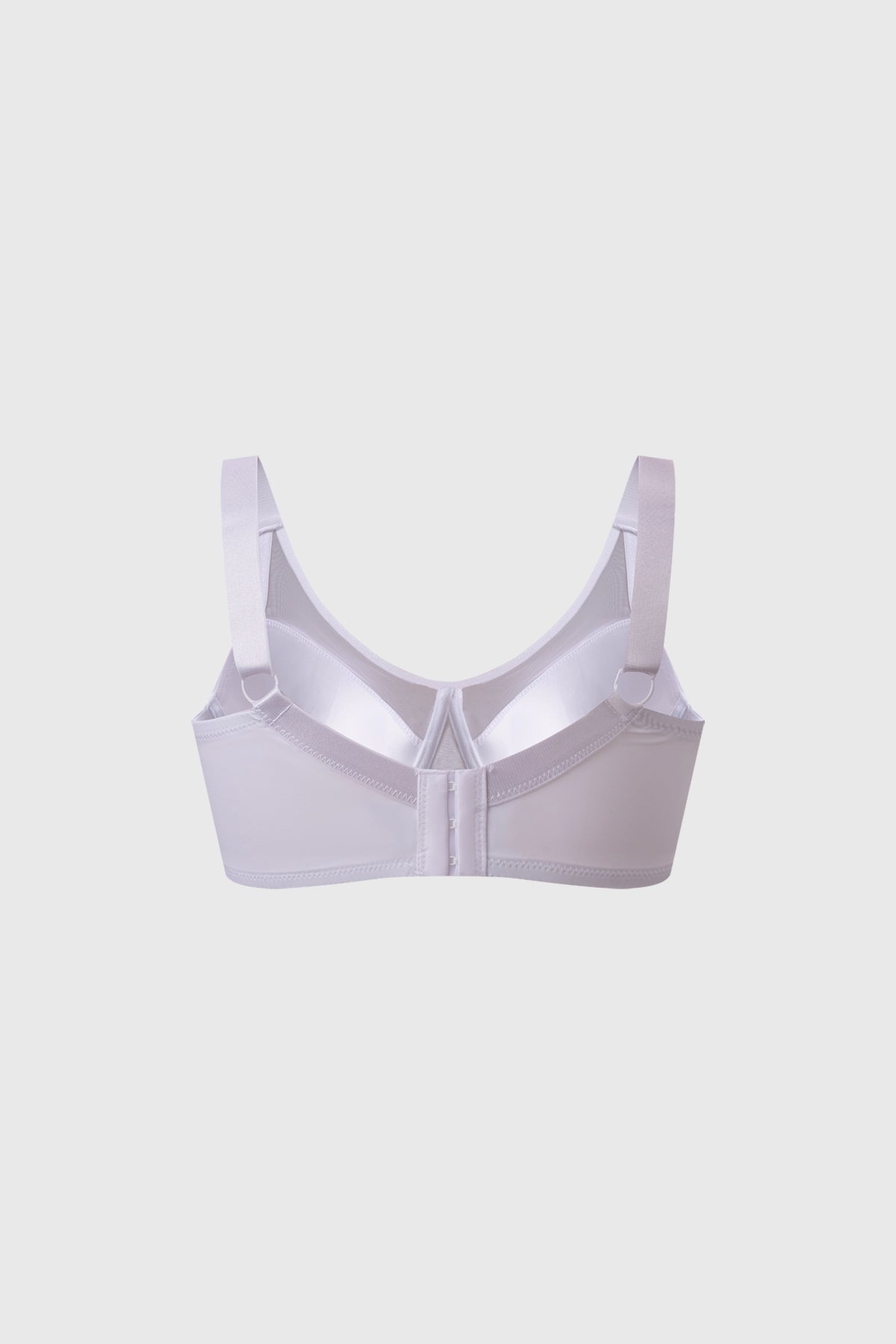 Sostén blanco con detalle de malla en la parte frontal diseño liso sin estampado