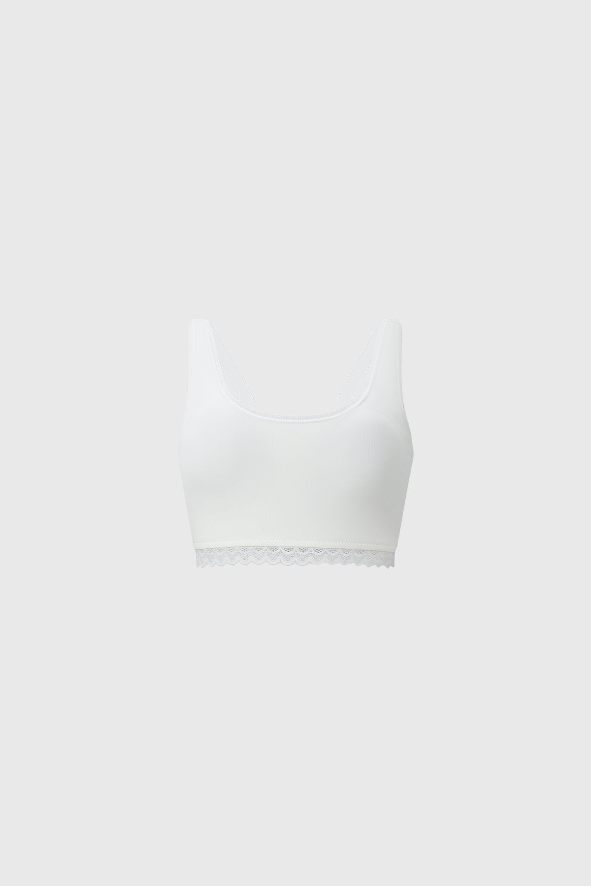Sostén blanco de mujer con detalle de encaje en la parte inferior diseño liso y moderno sin estampas