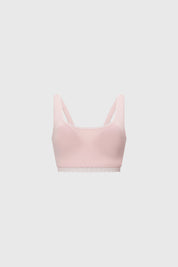 Sostén palo rosa con detalle de encaje en el borde inferior liso sin estampado