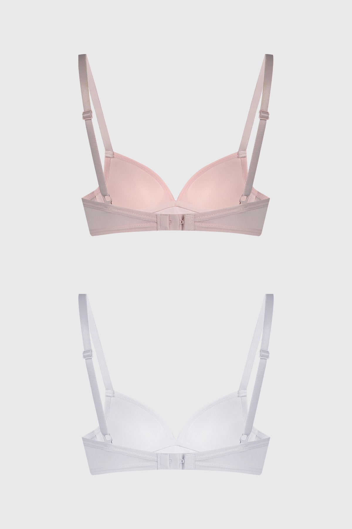 Sostén mujer palo rosa con tirantes delgados y pequeño lazo central diseño liso ideal para uso diario cómodo y suave