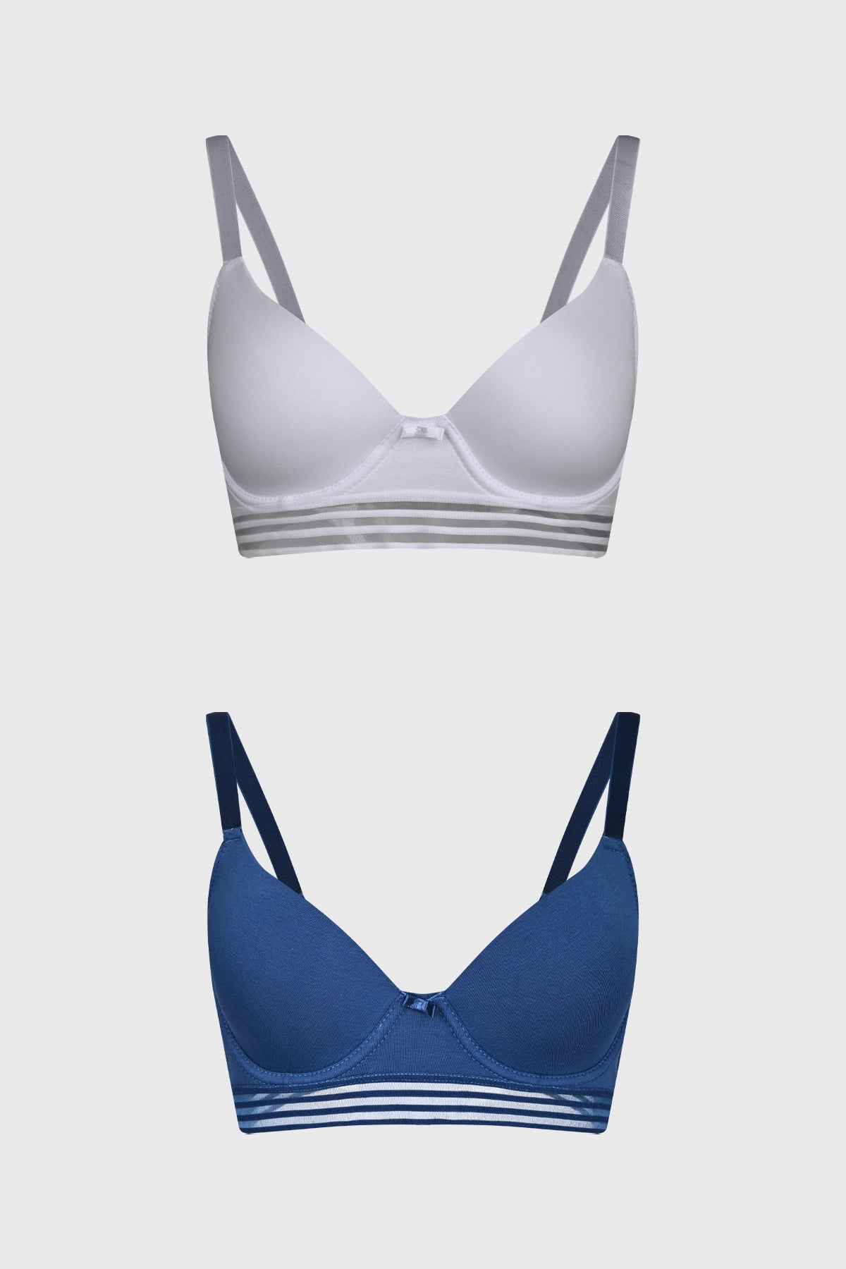 Sostén azul marino para mujer con copa soft y detalle de elástico a rayas en la base lisa y moderna
