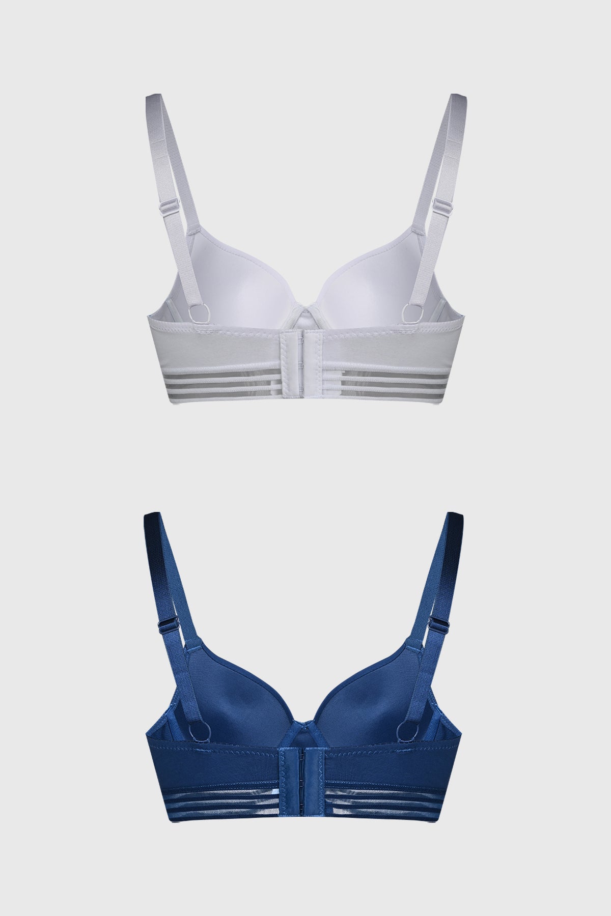 Sostén azul marino para mujer con copa soft y detalle de elástico a rayas en la base lisa y moderna