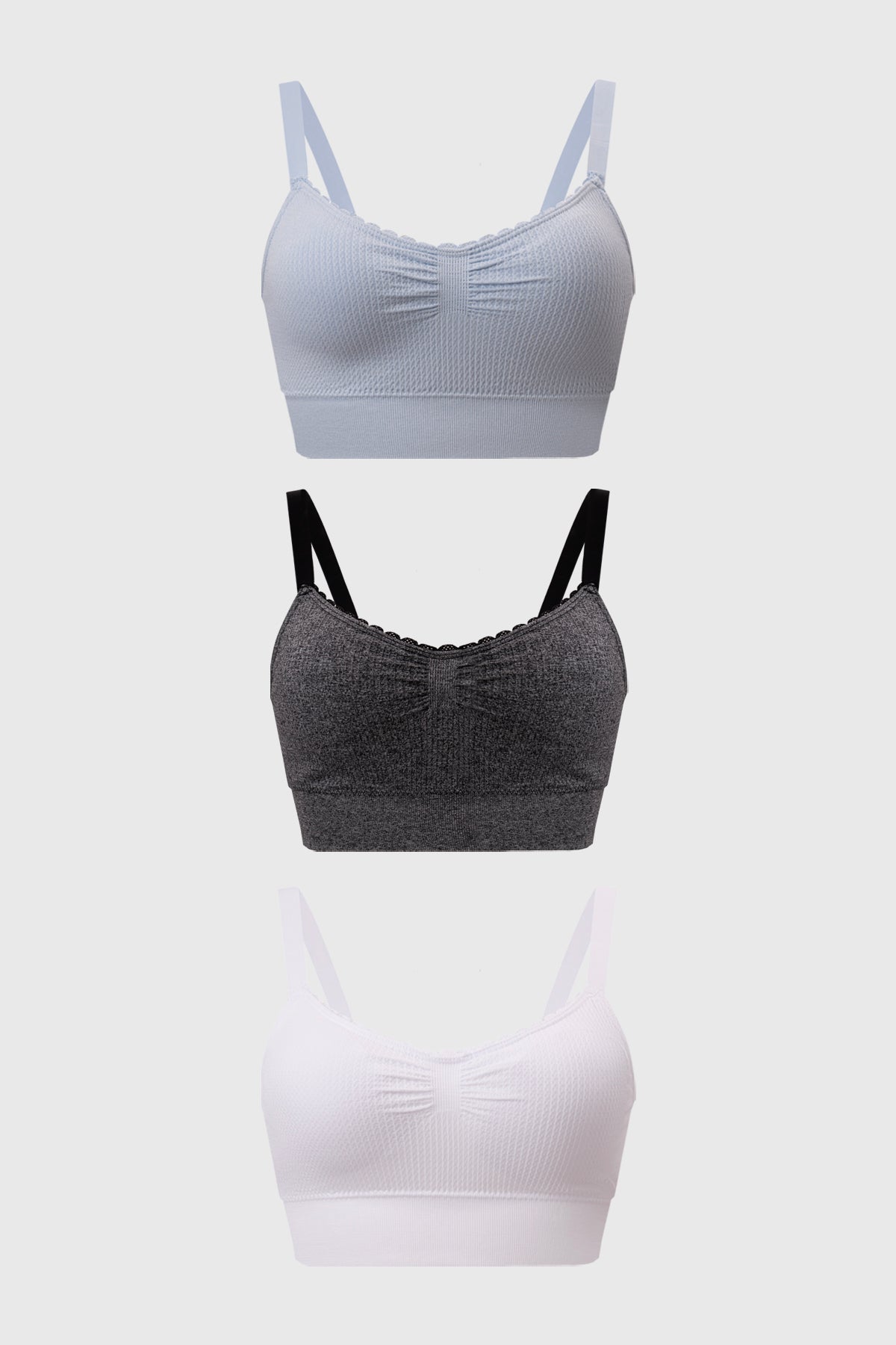 Tripack de sostenes juveniles en azul claro gris y blanco con diseño recogido sin estampa visibles ideales para el día a día