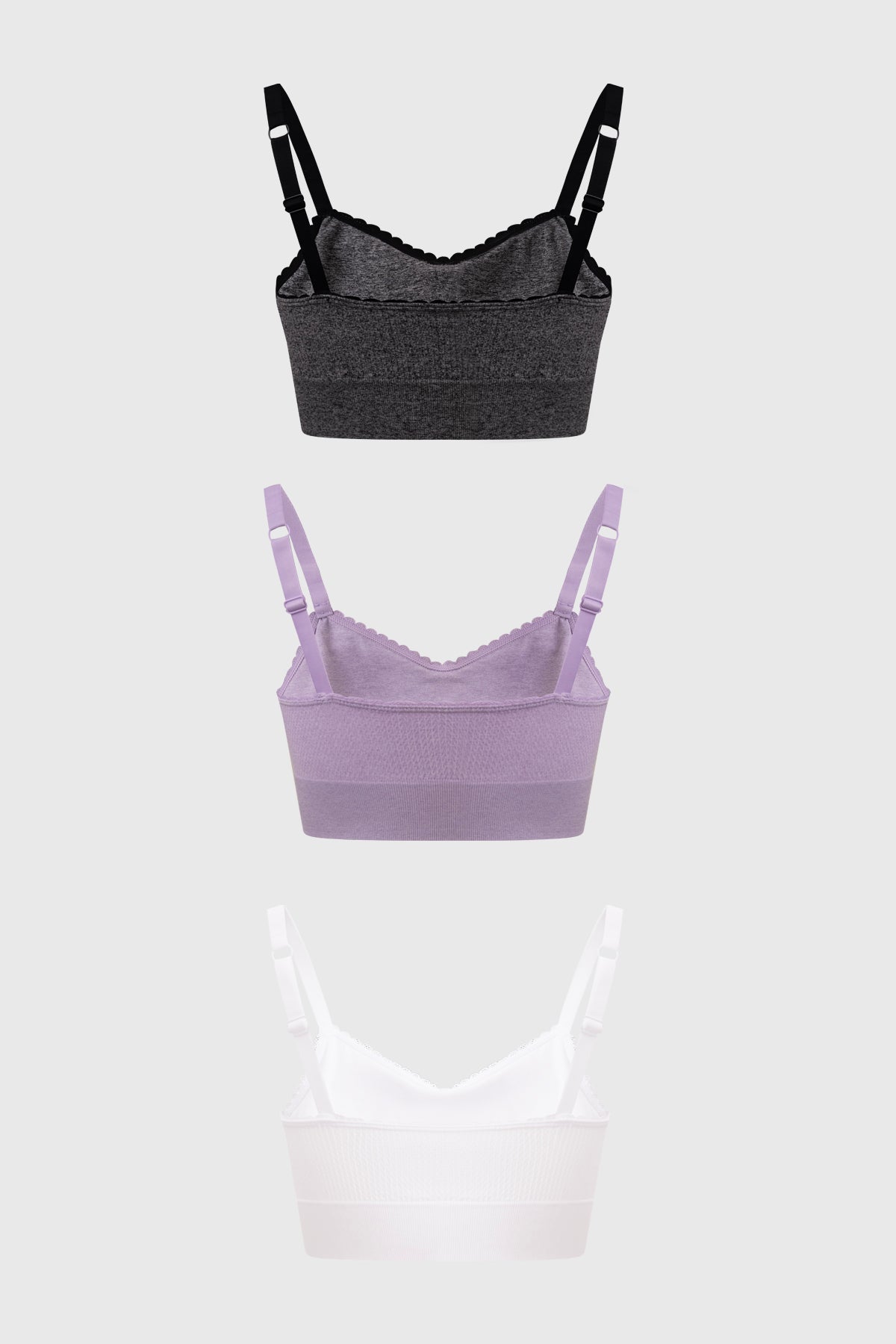Tripack de sostenes juveniles en lila gris y blanco sin estampas con tirantes finos y detalle fruncido al centro